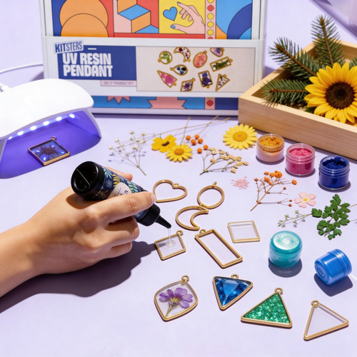 DIY UV Resin Pendant Kit by Kitsters showing clear resin pendants with pressed flowers